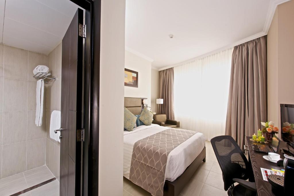 The Royal Riviera Hotel Doha Room photo